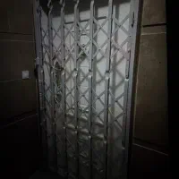 حفاظ درب آکاردئونی کرم روشن معاوضه با مشکی هم دارم