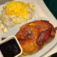 پلو اکبر جوجه با دورچین و سس انار ۱۲۵