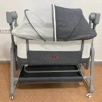 گهواره کنارمادربرقی