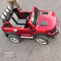 ماشین شارژی خوش رنگ شاسی بلند موزیکال دونفره نو