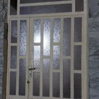 دوعدد پنجره و درب پذیرایی