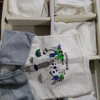 لباس وپتوی نوزادی