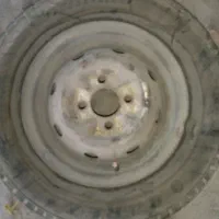 یک عدد لاستیک بارز۷۰ درصد پژوهی با رینگ|قطعات یدکی و لوازم جانبی|فولادشهر, A6|دیوار