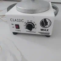 دستگاه وکس وموم