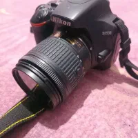 دوربین عکاسی نیکون همرا فیلتر یو وی