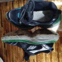 کفش بالنسیاگا|کیف، کفش، کمربند|قم, دروازه چوبی|دیوار