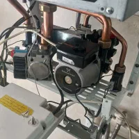 پکیج بوتان ۲۴ هزار دو مبدل فن دار|آبگرمکن، پکیج، شوفاژ|پرند, فاز ۴|دیوار