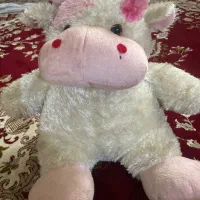 عروسک گاو صورتی