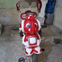 سه چرخه کودک و کاپشن سرهمی