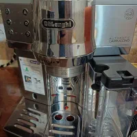 اسپرسوساز دلونگی اتومات فروش یا معاوضه با لپتاب