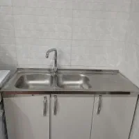 سینک و کابینت همراه با شیر ظرفشویی