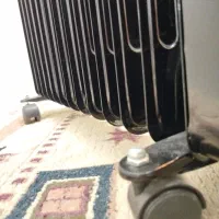 بخاری برقی همراه با فن و کارکرد روغن