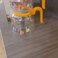 کتری قوری پیرکس روی گازی با شعله پخش کن