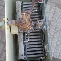 آبگرمکن بوتان اصل  بامبدل مس  قدیمی چند لایه ۱۸|آبگرمکن، پکیج، شوفاژ|لنگرود, |دیوار