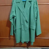 یک عدد مانتو به رنگ سبز پاستیلی