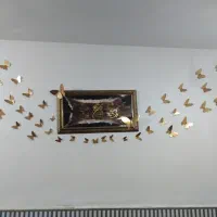 تابلو و پروانه تزیینی همراه با تابلو