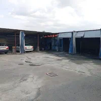 به دونفر کارگر درکارواش