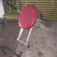دستگاه ورزشی شکم و زیرشکم زن