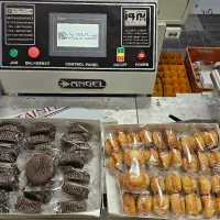 دستگاه بسته بندی انواع کیک و کلوچه و نان فانتزی