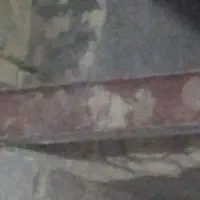 تیر آهن ۱۲ و صفحه ستون و تخته بنایی و بشکه