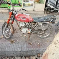 سوزوکی ax100