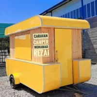 فروش لباس زنانه مانتو در مغازه سیار فست فود سیار