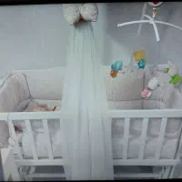 تخت و گهواره کنارمادر