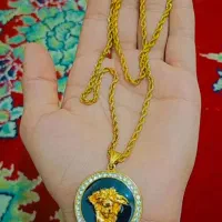 گردن بند طلا روس و انگشتر طلایی و چاقو