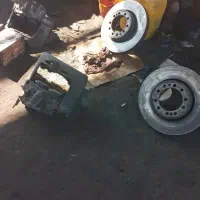 استادکارماهروشاگردآهنگرباچرخ بازکن کامیون