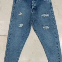 چرخکار صنعتی زن لی دوز.بیرون بر پارچه ای