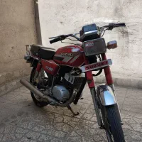 سوزوکی ax100