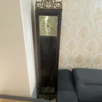 ساعت کمدی  پاندول دار با تاج و پایه ی برنز