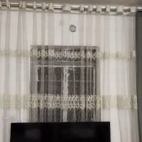 پرده توری گل دار پانچ