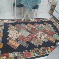 فرش حدود ۴ متری زمینه سرمه ای رنگ