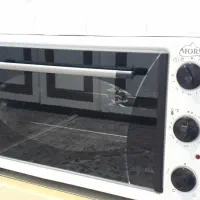 توستر یا ماکروفر جوجه گردان دار نو  luxcell