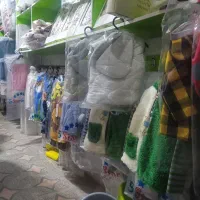 تخت و گهواره|کفش و لباس بچه|مینودشت, |دیوار