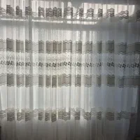 دوعدد پرده حریر گل دوزی شده و دوعدد آفتاب گیر