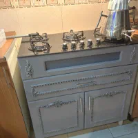 گاز رومیزی  نو همراه کابینت زیرش نو