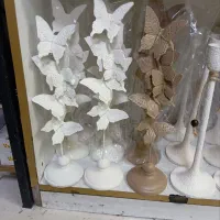 تندیس پروانه و شمعدان