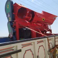 کوبیدن آفتابگردان بادستگاه