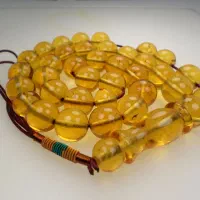 تسبیح کهربا طبیعی طلای لهستان به شرط کارشناسی شما