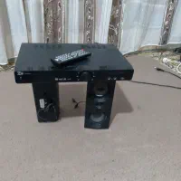 دی وی دی و باند به همراه کنترل