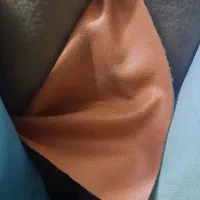 پارچه رومبلی ساده طرح چرم