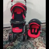 کالسکه و کریر در حد مغازه نو  قرمز مشکی اسپرت
