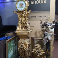 ساعت سرپاای و مجسمه