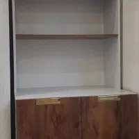 قفسه کتابخانه بهنراه کمد