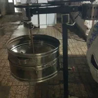 تخمه داغ کنی و ترازو