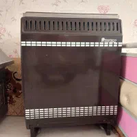 بخاری گازی-میز تلوزیون شیشه ای-تلوزیون ۲۱ اینچ ‌LG