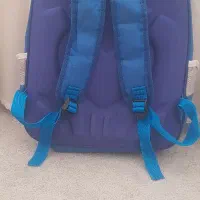 کوله مدرسه|کیف، کفش، کمربند|قم, بنیاد|دیوار