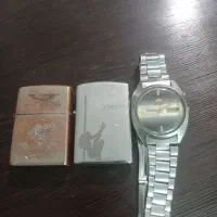 ساعت نبضی و دوتا فندک بنزینی